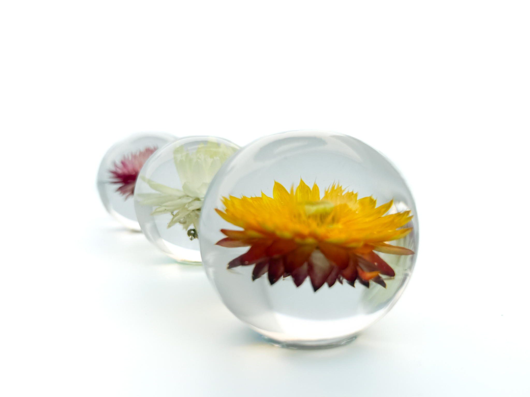 Group of three spheres side view